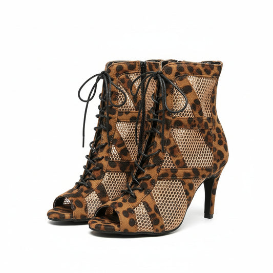 KicksStyle Seraphina — bold elegance in a single heel. With a wild print, breathable cutouts and a sensual lace-up design, this model brings striking presence, comfort and attitude to elevate any look with luxury and personality.
